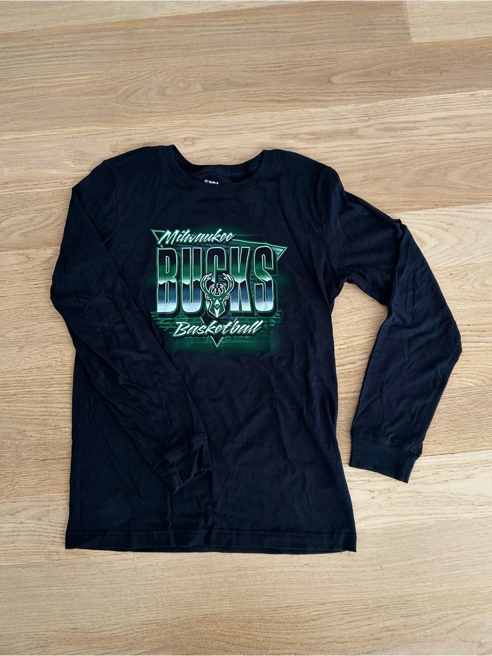 NBA Milwaukee Bucks Black Long-Sleeve Graphic Tee with Green Logo